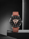 TOMI T-042 men's date quartz watch with brown leather strap on black display stand