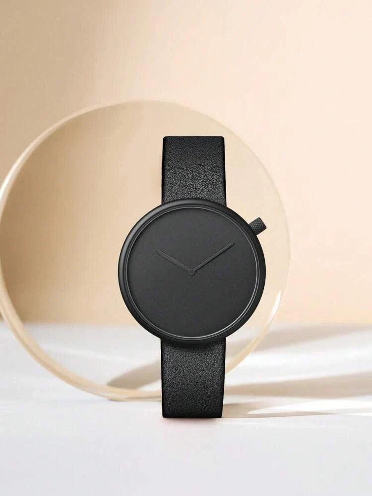 TOMI T-078 Unisex Watch Leather Strap - All-black minimalist watch standing upright against a light background.