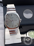 TOMI T-307 men's quartz stainless steel watch with silver dial on display stand
