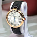 TOMI T-075 luxury wristwatch featuring a rose gold bezel, white dial, and black leather strap