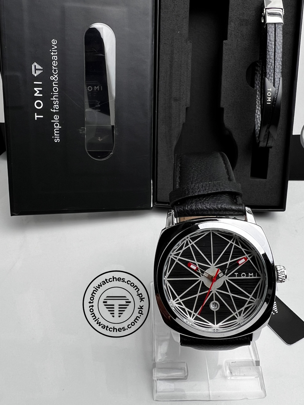 TOMI T-112 black leather strap watch with geometric black dial