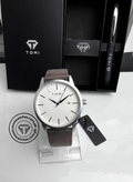 TOMI T-071 men's white dial date watch displayed with TOMI premium pen gift set