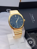 TOMI T-307 men's quartz stainless steel watch with blue dial and gold-tone strap on display