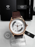White dial TOMI T-099 watch with brown leather strap and rose gold case on display stand
