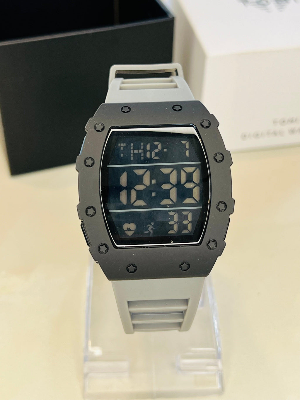 TOMI T-230 Digital Sports Watch - Light grey digital sports watch with a black digital screen.