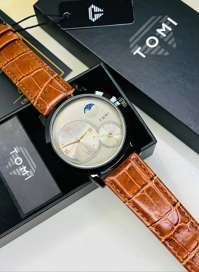 TOMI T-036 Moon Edition watch displayed with TOMI packaging and brown leather strap