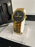 TOMI T-303 S3 Series black dial gold-tone business watch angled display