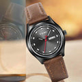 TOMI T-030 Men's Watch – Close-up of the black dial watch with a brown leather strap.