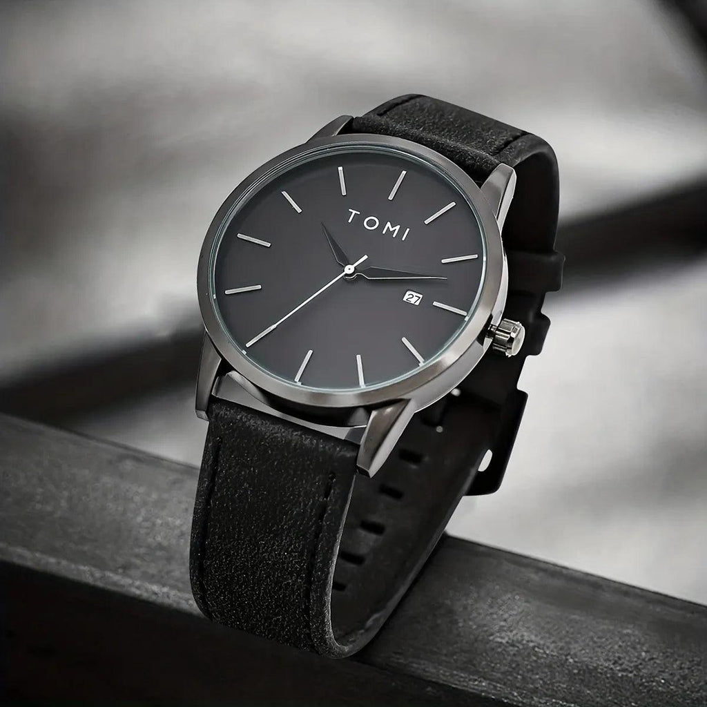 TOMI T-071 Men's Watch Date Quartz - Black dial watch with black leather strap sitting on a dark ledge.