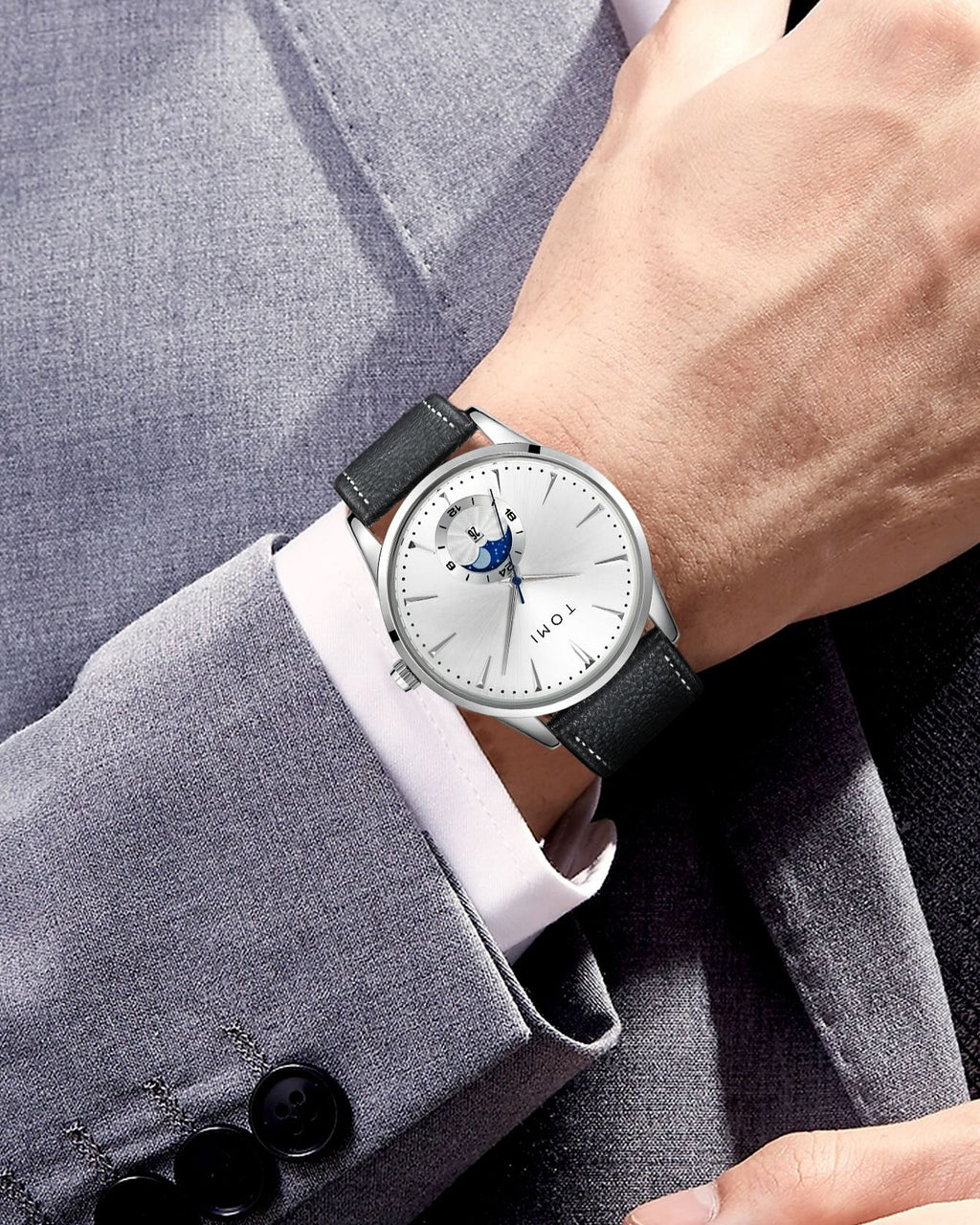 TOMI T-024 formal wristwatch paired with suit sleeve on wrist