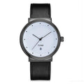 TOMI T-091 Men's Round Dial Watch - Dark bezel watch with a white dial and black leather strap.