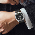 Luxury men's wristwatch complementing a formal business outfit