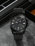TOMI T-041 Date Quartz Business Watch black leather strap styled on dark surface