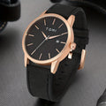 TOMI T-071 Men's Watch Date Quartz - Black dial watch with rose gold bezel and black leather strap shown at an angle.